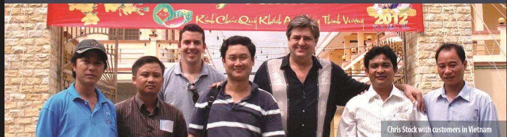 Chris Stock with customers in Vietnam